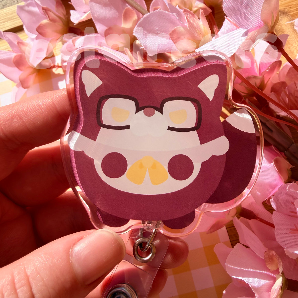 valko merch - decals, phone grip, badge reel, and phone charms!