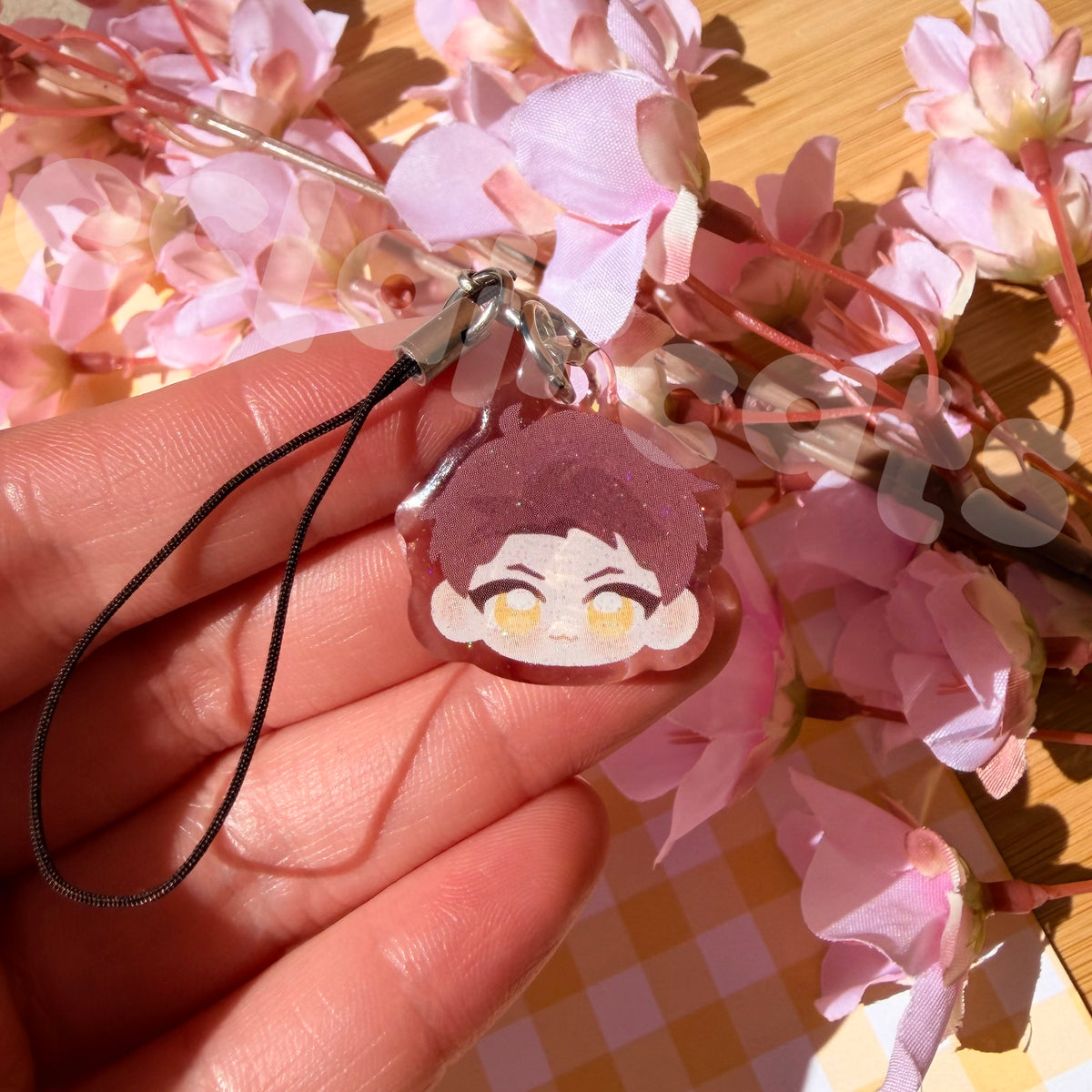 valko merch - decals, phone grip, badge reel, and phone charms!